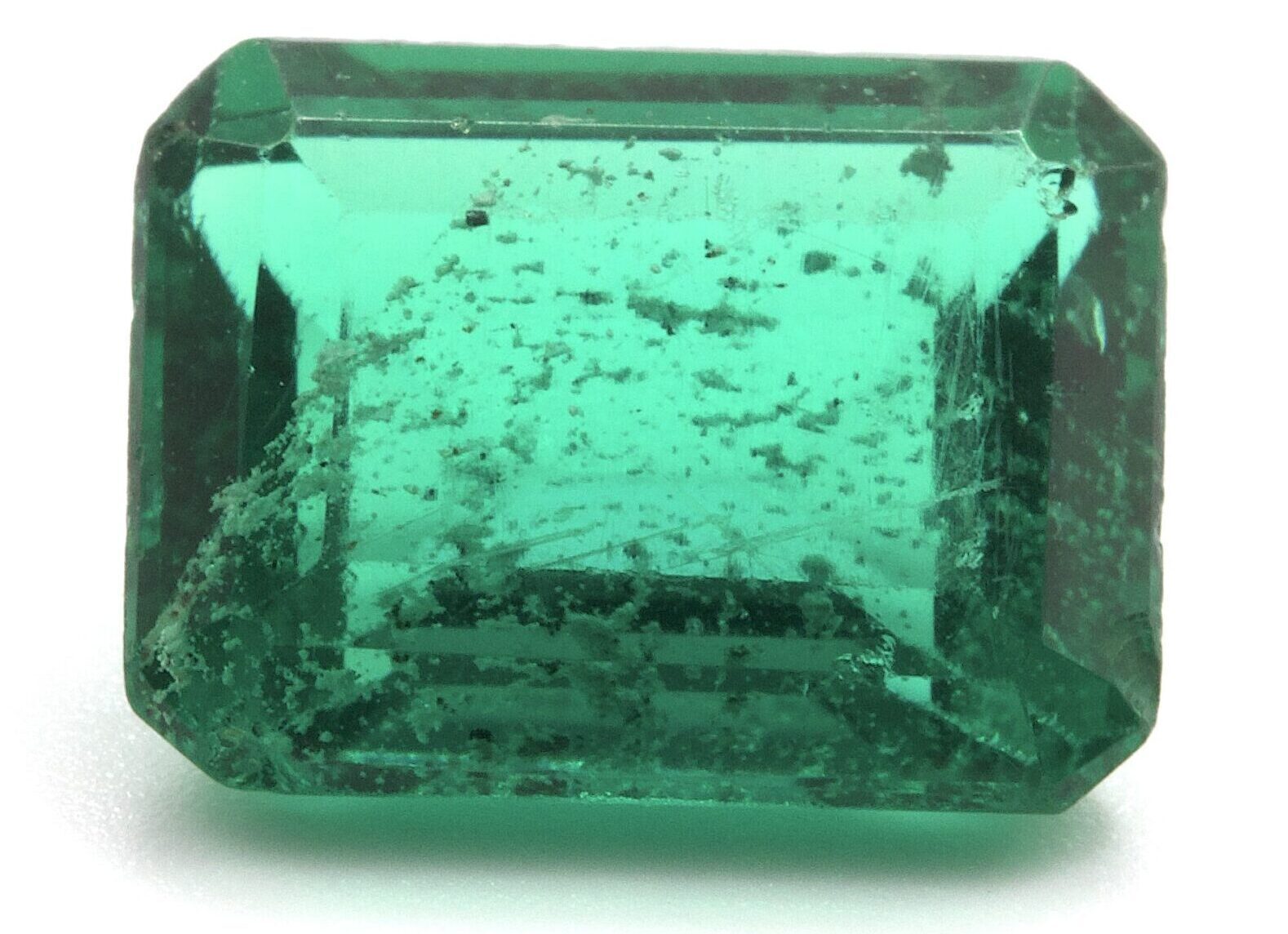 Gem Knowledge: What is Artificial Glass ‘Paste’ in Antique Jewellery - Artificial Glass Paste - Paste simulating emerald GK 1a scaled e1718389969684